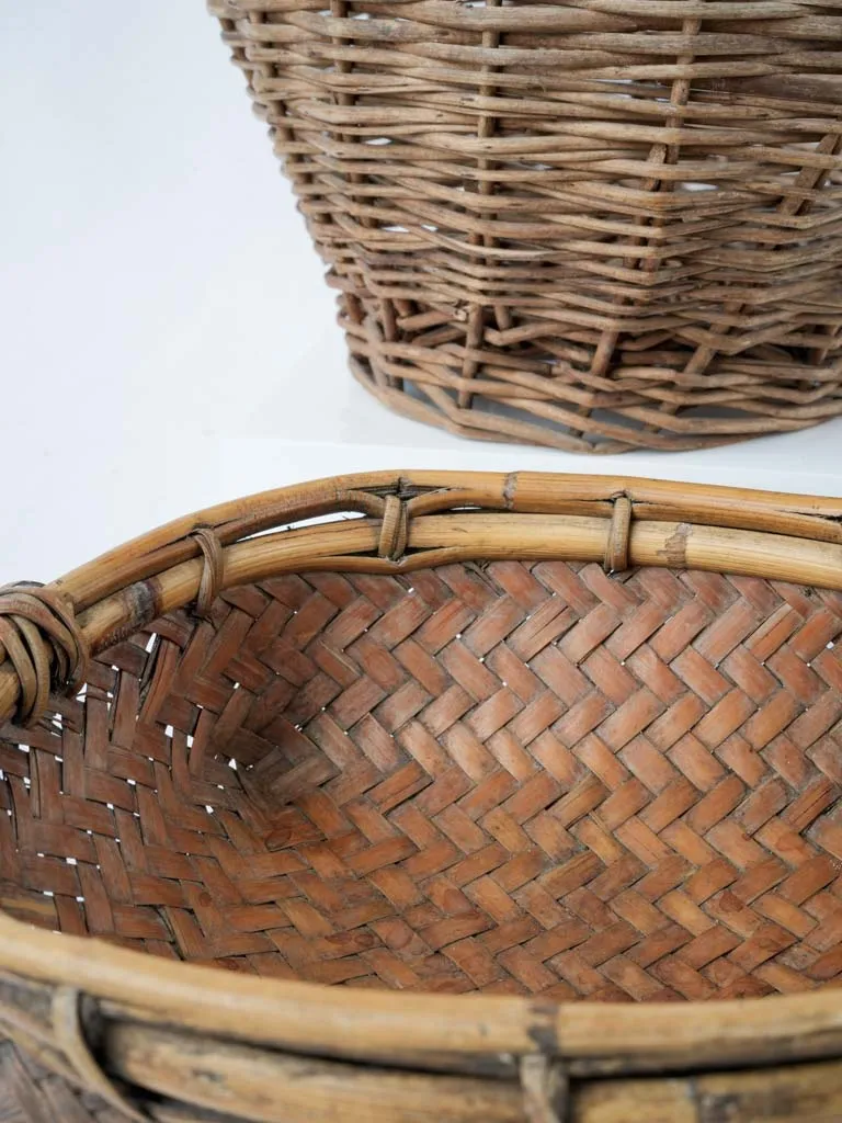 Two petit vintage wicker woven baskets